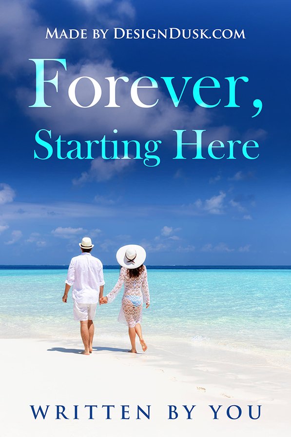 A couple dressed in white hold hands as they walk along a bright tropical beach toward a turquoise sea.